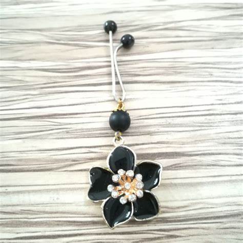 خرید بهترین گیره روسری طرح گل مشکی