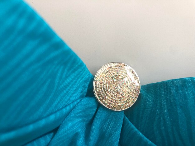 قیمت خرید عمده جدید ترین مدل گیره روسری و شال فانتزی