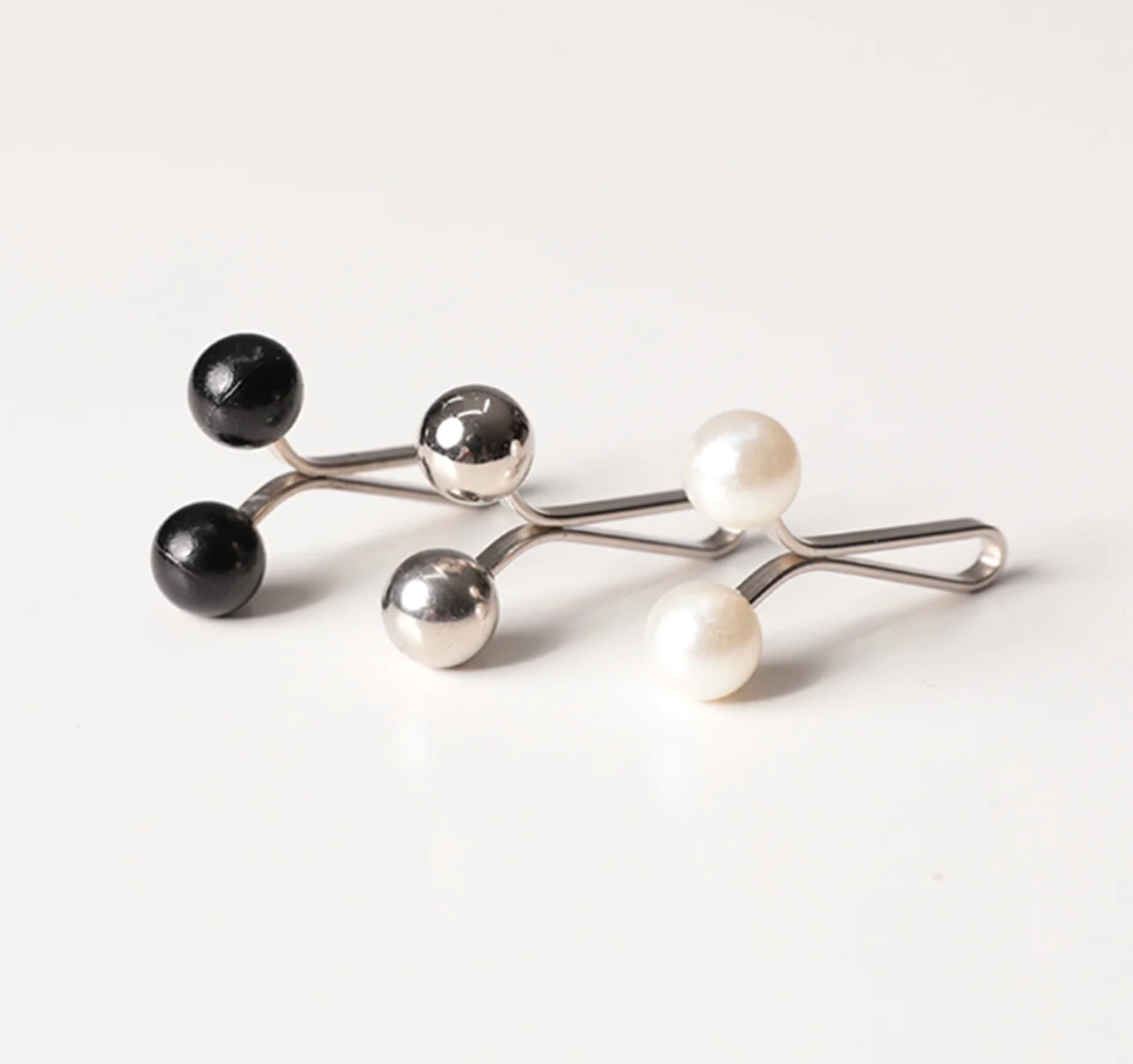 خرید بهترین گیره روسری مجلسی طرح گل مشکی